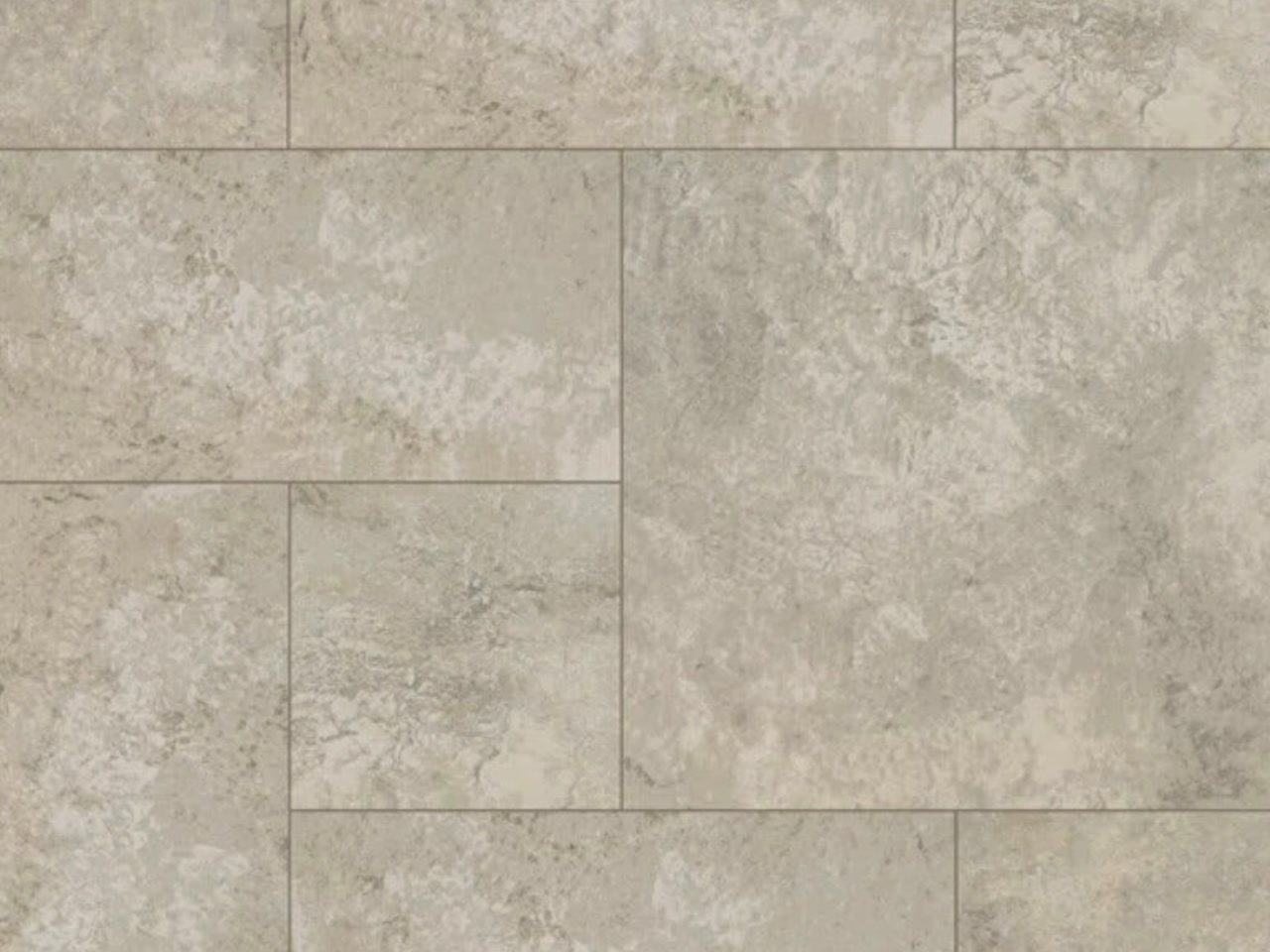 Light gray porcelain paver driveway with a stone-look finish